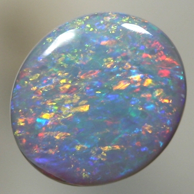 SOLID SEMI BLACK OPAL Pretty Floral pattern with reds and orange over blue